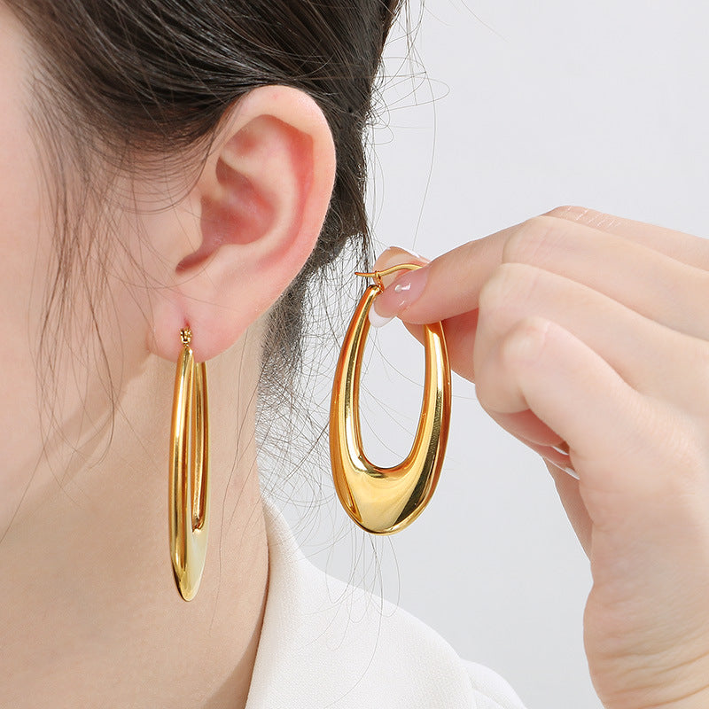 Light luxury and high-end titanium steel U-shaped glossy earrings stainless steel hollow earrings