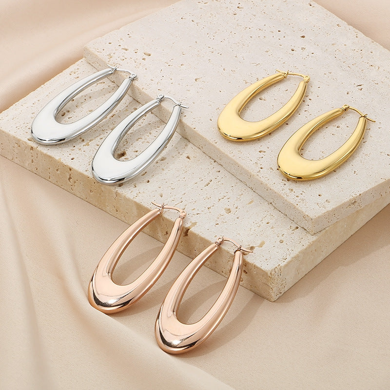 Light luxury and high-end titanium steel U-shaped glossy earrings stainless steel hollow earrings