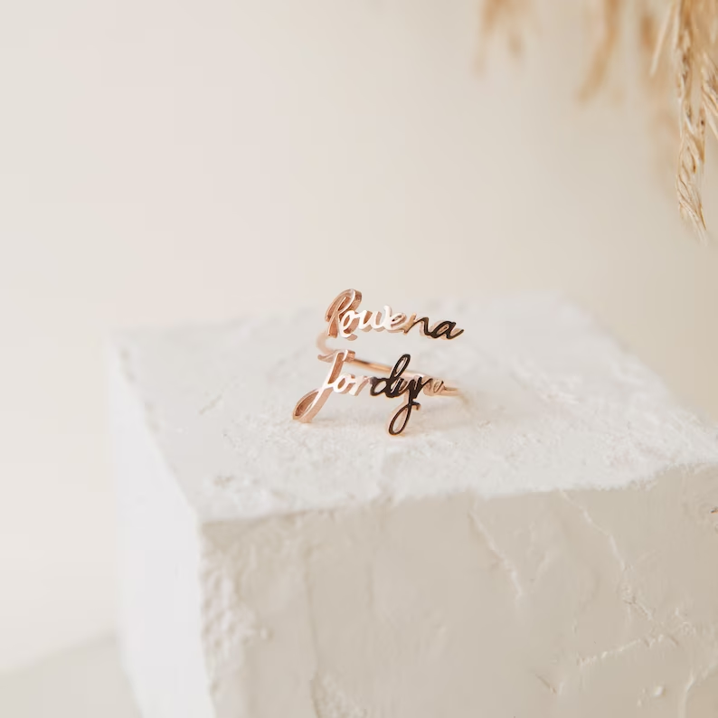 Double name rings Double name rings in sterling silver, yellow gold and rose gold